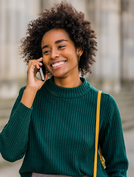 Person talking on the phone with a dental office in Stratford
