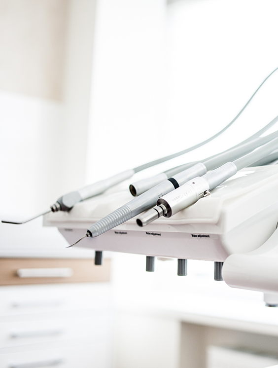 Row of dental instruments in a treatment room
