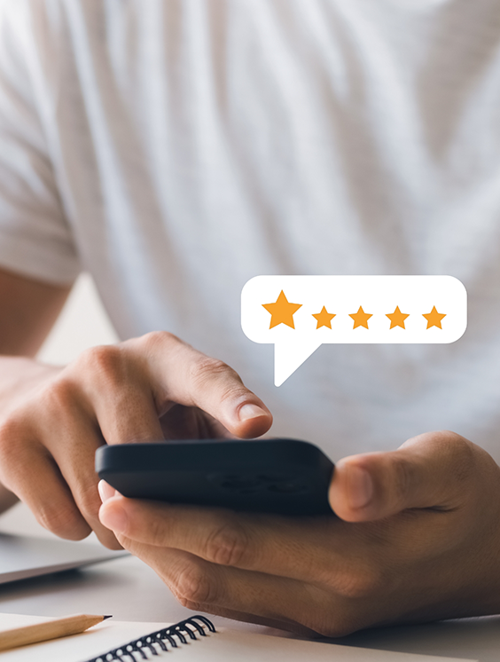 Person leaving a five star review on their phone